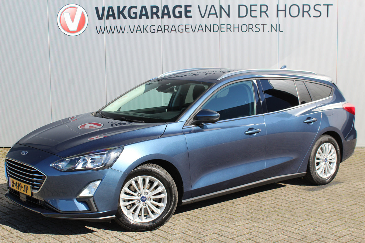 Ford FOCUS Wagon 1.0-155pk EcoBoost Titanium. Erg nette en goed onderhouden wagen met slechts 60.000km. Autm. airco dual, camera, stoel-, stuur- en voorraamverwarming, trekhaak, LM wielen, metallic lak, navigatie, telefoonvoorb. etc.