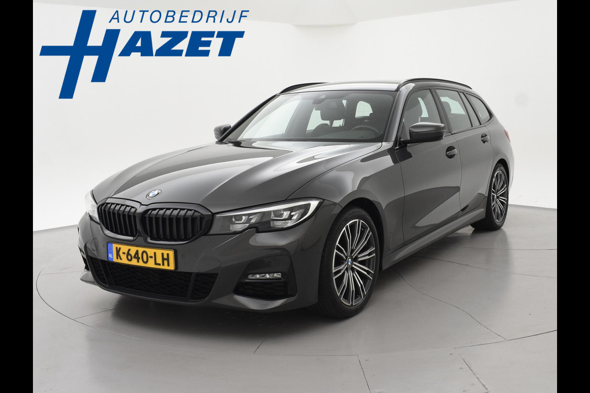 BMW 3 Serie Touring 318i AUT. M-SPORT DRAVITGRAU + SPORTSTOELEN | CAMERA | MEMORY | HIFI | SFEERVERLICHTING | CARPLAY
