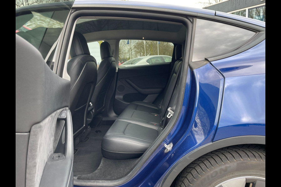 Tesla Model Y Long Range AWD 75 kWh VAN: 34.900,- VOOR: 32.877,- UW LENTEVOORDEEL: 3.023,- | RIJKLAARPRIJS INCL. 12MND BOVAG | TREKHAAK | SOH 95% |