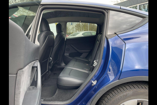 Tesla Model Y Long Range AWD 75 kWh VAN: 34.900,- VOOR: 32.877,- UW LENTEVOORDEEL: 3.023,- | RIJKLAARPRIJS INCL. 12MND BOVAG | TREKHAAK | SOH 95% |