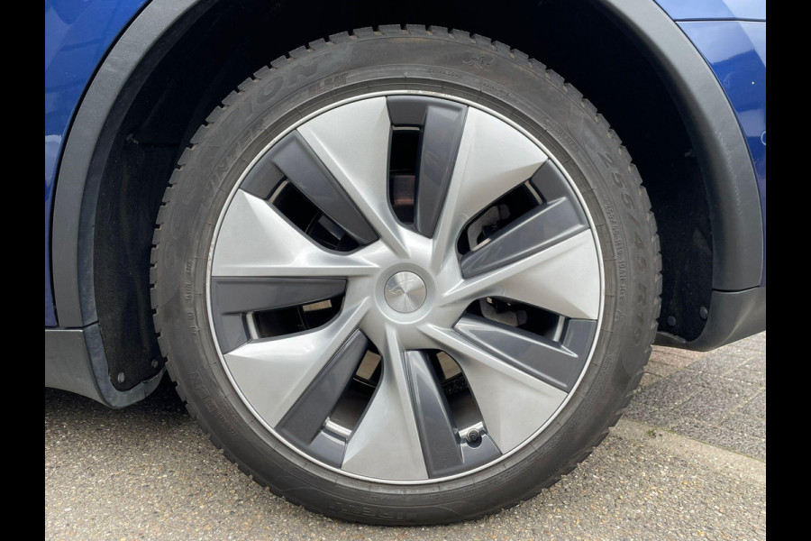 Tesla Model Y Long Range AWD 75 kWh VAN: 34.900,- VOOR: 32.877,- UW LENTEVOORDEEL: 3.023,- | RIJKLAARPRIJS INCL. 12MND BOVAG | TREKHAAK | SOH 95% |