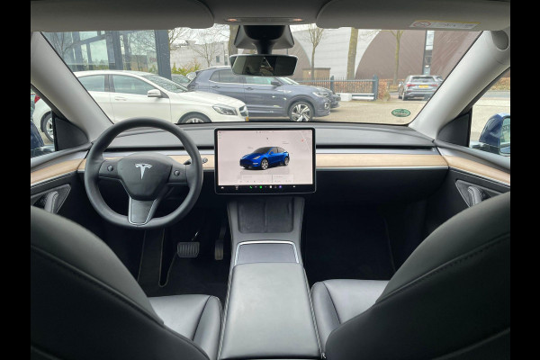 Tesla Model Y Long Range AWD 75 kWh VAN: 34.900,- VOOR: 32.877,- UW LENTEVOORDEEL: 3.023,- | RIJKLAARPRIJS INCL. 12MND BOVAG | TREKHAAK | SOH 95% |