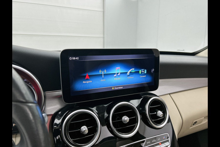 Mercedes-Benz C-Klasse Estate 180 Business Solution Avantgarde Trekhaak | Panoramadak | Multi spaaks lichtmetalen velgen | Navigatie | Parking support | Inclusief 24 maanden MB Certified garantie voor Europa.