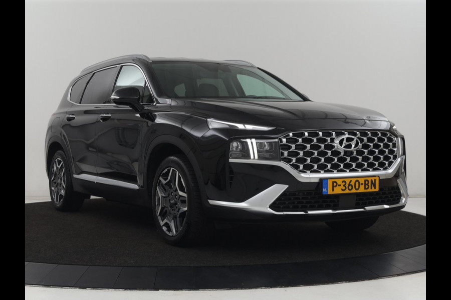 Hyundai Santa Fe 1.6 T-GDI PHEV Premium 7 Persoons | SOH 97,2% | Stoelventilatie | Trekhaak | Head-Up | Leder | Achterbankverwarming | 360 Camera | Carplay | Keyless | Adaptive cruise | Navigatie | Plug In
