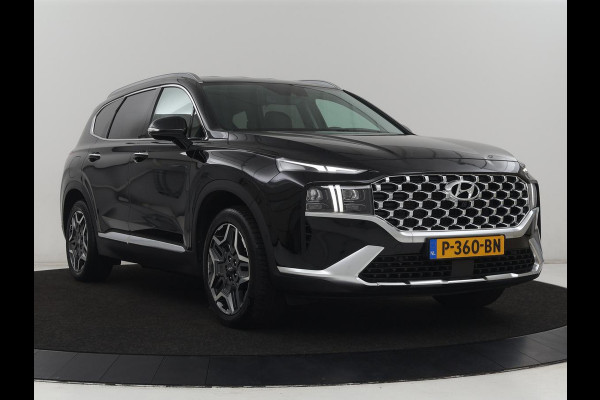 Hyundai Santa Fe 1.6 T-GDI PHEV Premium 7 Persoons | SOH 97,2% | Stoelventilatie | Trekhaak | Head-Up | Leder | Achterbankverwarming | 360 Camera | Carplay | Keyless | Adaptive cruise | Navigatie | Plug In