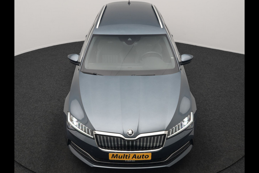 Škoda Superb Combi 1.4 TSI iV Laurin & Klement PHEV 218pk Dealer O.H. | Adaptive Cruise | 360 Camera | Canton Audio | Lederen Comfortstoelen Memory & Massage & Ventilatie | Sfeerverlichting | Stoelen & Stuur Verwarmd | Apple Carplay | Blis | Keyless | Plug In Hybrid |