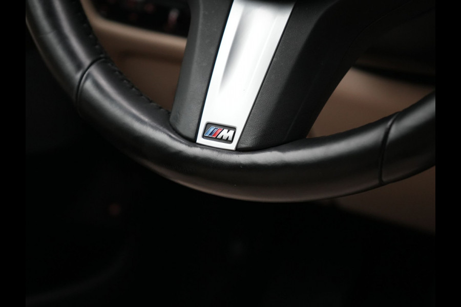 BMW X5 xDrive45e X Line PHEV 395pk Dealer O.H. | Trekhaak Af Fabriek | Luchtvering | Adaptive Cruise | Head Up | 360 Camera | Adaptief Onderstel | Laser LED | Lederen Sportstoelen Memory & Verwarmd | Sfeerverlichting | Keyless | Plug In H