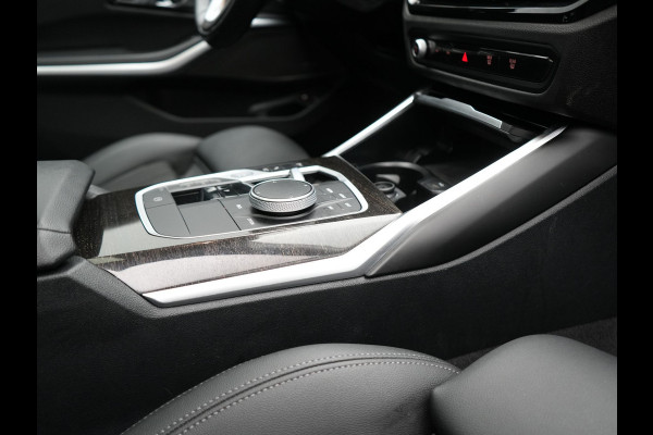 BMW 3 Serie Touring 320e Sportline FACELIFT PHEV Dealer O.H | Panodak | Widescreen Navi | Harman Kardon | Camera | Keyless | Stuurverwarming | Apple Carplay | BLIS | Plug In Hybrid
