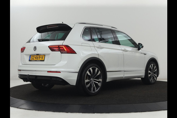 Volkswagen Tiguan 1.4 TSI R Line | Panoramadak | Stoelverwarming | LED Plus | Trekhaak | Camera | Keyless | 20'' | Adaptive cruise | Virtual Cockpit | Navigatie | Park Assist | DAB | Climate control | Getint glas