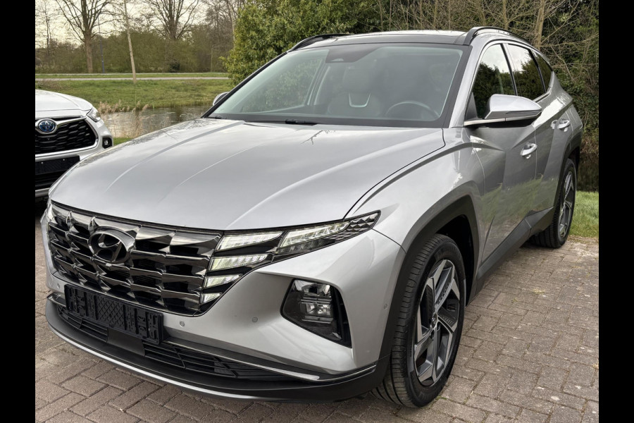 Hyundai Tucson 1.6 T-GDI HEV Premium Sky | Panoramadak | Afneembare trekhaak | Stoelverwarming/koeling | Camera