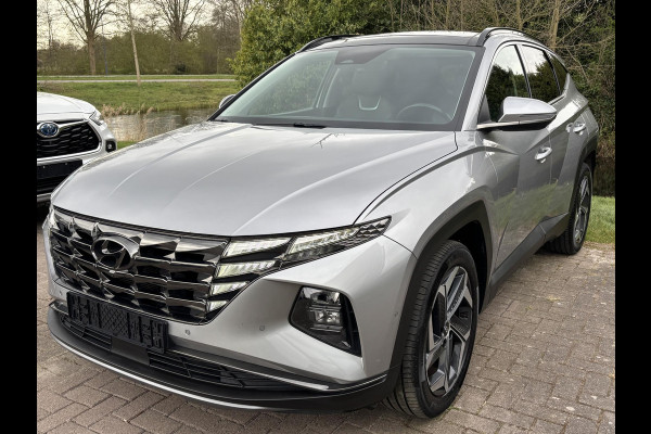 Hyundai Tucson 1.6 T-GDI HEV Premium Sky | Panoramadak | Afneembare trekhaak | Stoelverwarming/koeling | Camera