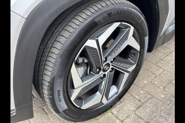 Hyundai Tucson 1.6 T-GDI HEV Premium Sky | Panoramadak | Afneembare trekhaak | Stoelverwarming/koeling | Camera