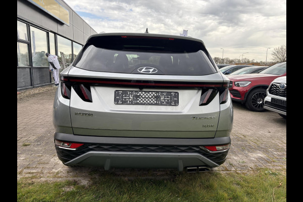 Hyundai Tucson 1.6 T-GDI HEV Premium Sky | Panoramadak | Afneembare trekhaak | Stoelverwarming/koeling | Camera