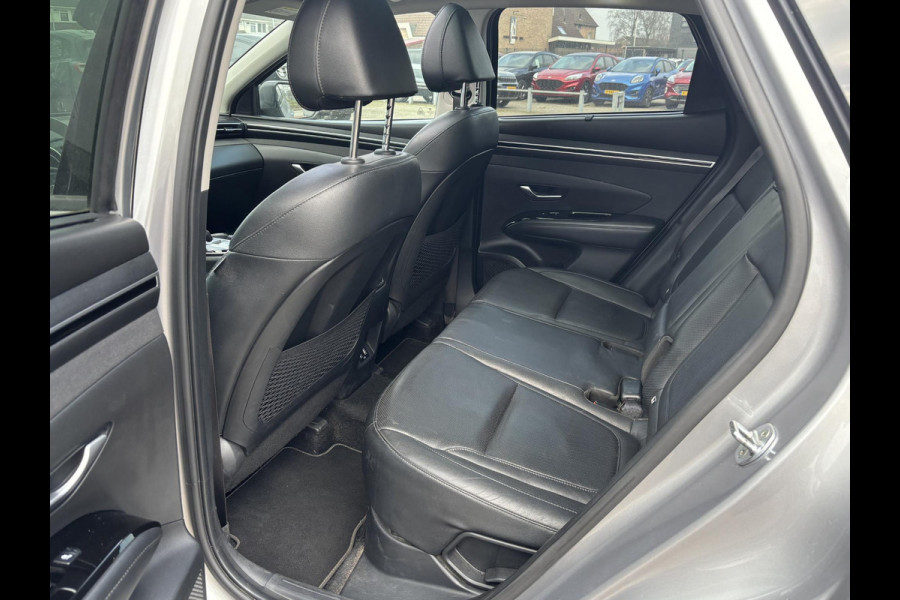 Hyundai Tucson 1.6 T-GDI HEV Premium Sky | Panoramadak | Afneembare trekhaak | Stoelverwarming/koeling | Camera