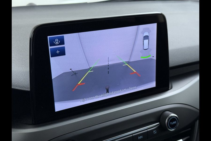 Ford FOCUS Wagon T 125PK Hybride Trekhaak Navi Camera LED Dual-ECC Keyless FordPass-ConnectStoel+Stuur+Voorruitverwarming Apple Carplay Android A DAB Bluetooth Lmv 17" Ecc GSM Draadloos Opladen Led Privacy Glas Isofix Lane Assist Keyless Licht-/regensensor Origineel Nederlandse Auto  € 34.000 nieuw