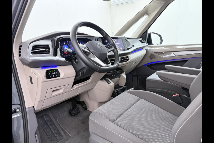 Volkswagen Multivan Bulli 218PK eHybrid AUT-6 Pano-Dak Navi 3-Zone Ecc Cruise Control Camera Trekhaak Apple Carplay Android Pdc Stoelverwarming Life 2+2+2 Premium Zitopstelling Keyless Lmv 19" Easy Open Pack Privacy Glas Elek.Achterklep Led Origineel Nederlandse Bus Dealeronderhouden 1.600kg trekvermogen
