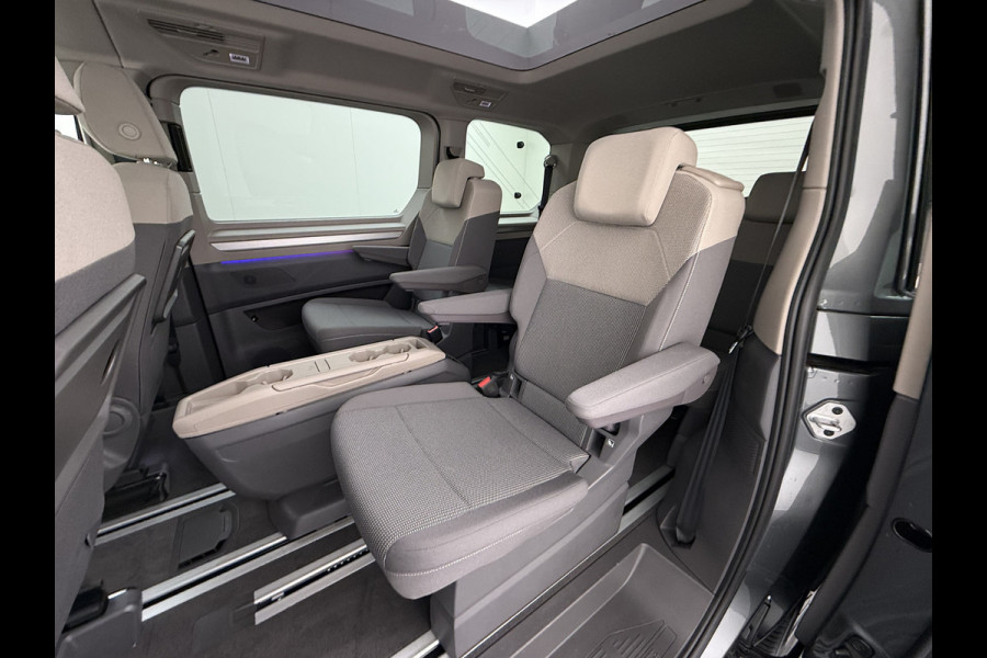 Volkswagen Multivan Bulli 218PK eHybrid AUT-6 Pano-Dak Navi 3-Zone Ecc Cruise Control Camera Trekhaak Apple Carplay Android Pdc Stoelverwarming Life 2+2+2 Premium Zitopstelling Keyless Lmv 19" Easy Open Pack Privacy Glas Elek.Achterklep Led Origineel Nederlandse Bus Dealeronderhouden 1.600kg trekvermogen