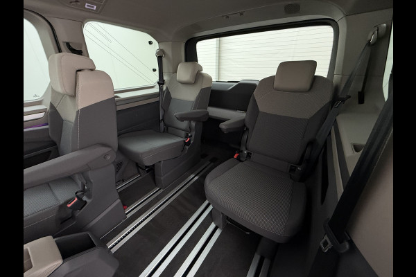Volkswagen Multivan Bulli 218PK eHybrid AUT-6 Pano-Dak Navi 3-Zone Ecc Cruise Control Camera Trekhaak Apple Carplay Android Pdc Stoelverwarming Life 2+2+2 Premium Zitopstelling Keyless Lmv 19" Easy Open Pack Privacy Glas Elek.Achterklep Led Origineel Nederlandse Bus Dealeronderhouden 1.600kg trekvermogen