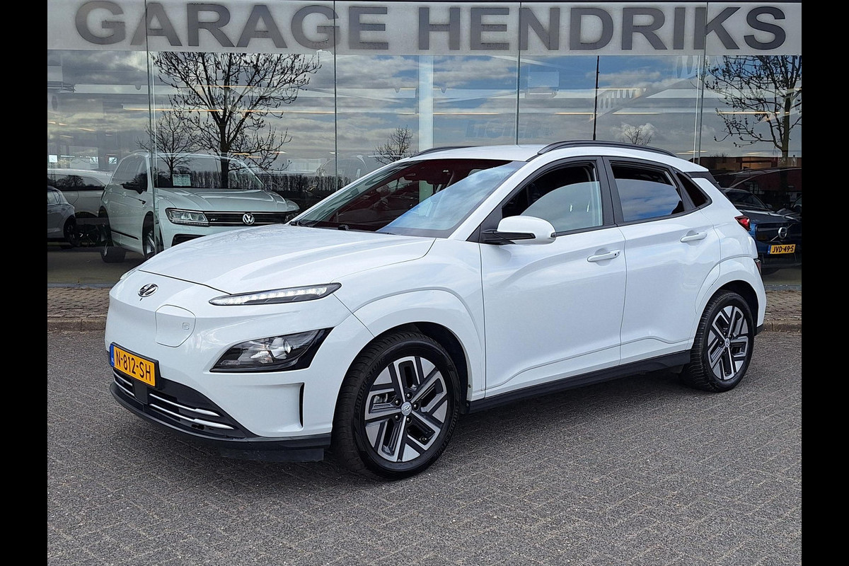 Hyundai Kona EV Fashion 64 kWh | SOH: nnb | 3 Fase | Warmtepomp | Blindspot | Navi | Camera |