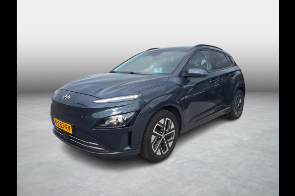 Hyundai Kona EV Fashion 64 kWh | SOH: 94,5% | 3 Fase | Warmtepomp | Blindspot | Navi | Camera |
