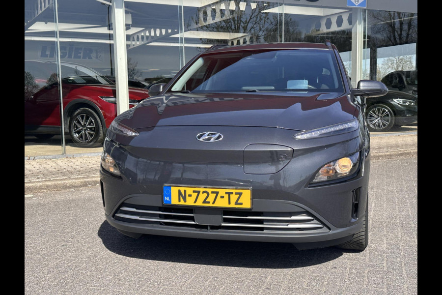 Hyundai Kona EV Fashion 64 kWh | SOH: 96,3%| Facelift | 3 Fase | Warmtepomp | Navi | HUD | Adaptive CC | Camera |