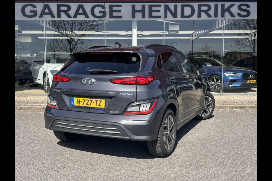 Hyundai Kona EV Fashion 64 kWh | SOH: 96,3%| Facelift | 3 Fase | Warmtepomp | Navi | HUD | Adaptive CC | Camera |
