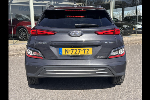 Hyundai Kona EV Fashion 64 kWh | SOH: 96,3%| Facelift | 3 Fase | Warmtepomp | Navi | HUD | Adaptive CC | Camera |