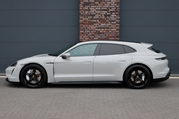 Porsche Taycan Sport Turismo 79 kWh | Achterasbesturing | Luchtvering | Sport-Chrono | ACC | Panoramadak | 18-wegs | BOSE |  Memory | Surround Camera | Verwarmd Stuurwiel |