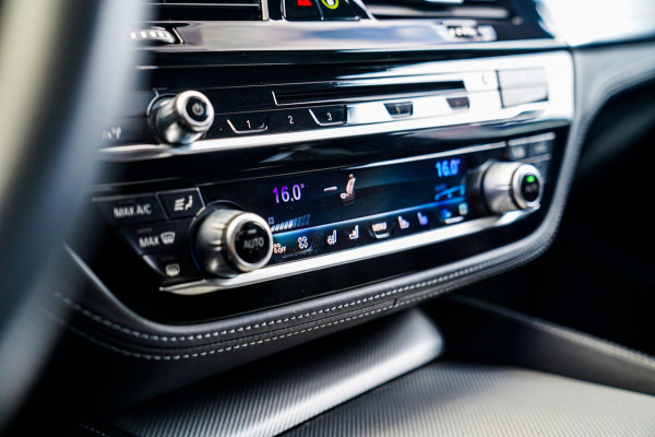BMW 5 Serie M5 | Sport uitlaat | Head up Display | Driving Assistant Plus | Carbon Dak | Harman/Kardon | Stoelverkoeling | 360 Cam