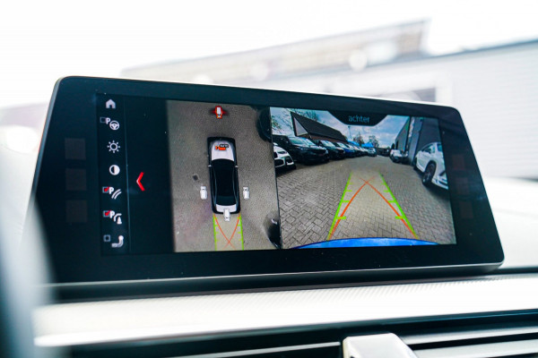 BMW 5 Serie M5 | Sport uitlaat | Head up Display | Driving Assistant Plus | Carbon Dak | Harman/Kardon | Stoelverkoeling | 360 Cam