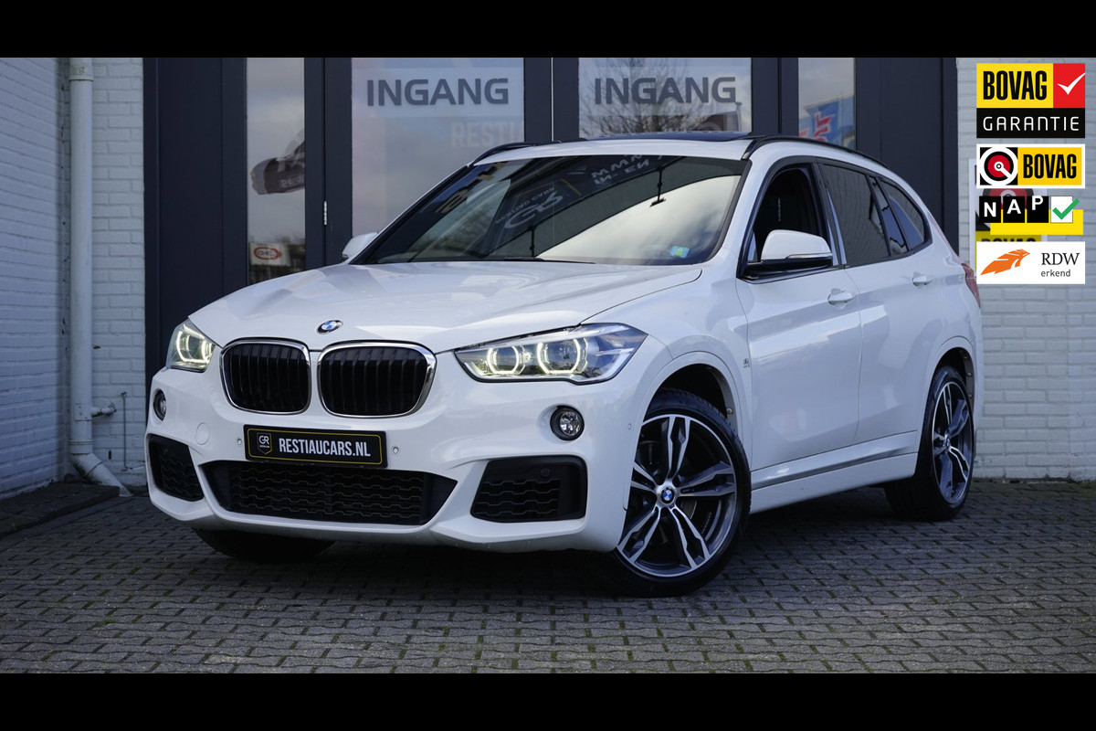 BMW X1 SDrive20i M Sport Shadowline CAMERA-CLIMA-CRUISE-FULL LED-HEADUP-LEDER-NAVIGATIE-PANORAMA-STOELVERWARMING-TREKHAAK