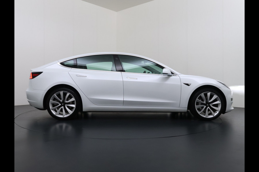 Tesla Model 3 SR+ 325PK LFP-Accu Trekhaak 19"Lmv AutoPilot Leer Pano-Dak Adaptive Cruise Lmv 18" Camera's Elektr.-Stuur+Stoelen+Spiegels+Geheu Ecc Navi Led DAB Voorverwarmen interieur via App Keyless One-Pedal-Drive Origineel Nederlandse Auto LFP accu dus 100% opladen!