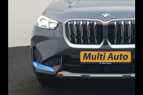 BMW iX1 xDrive30 Launch Edition 313pk Dealer O.H | Panodak | Adaptive Cruise | 360 Camera | Lederen Comfortzetels Massage & Memory | Head Up | Harman Kardon | Keyless |