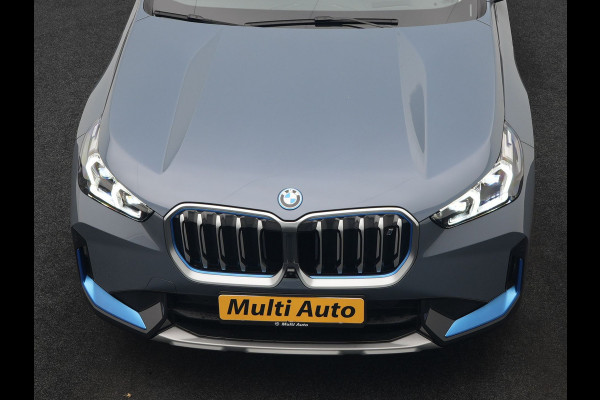 BMW iX1 xDrive30 Launch Edition 313pk Dealer O.H | Panodak | Adaptive Cruise | 360 Camera | Lederen Comfortzetels Massage & Memory | Head Up | Harman Kardon | Keyless |