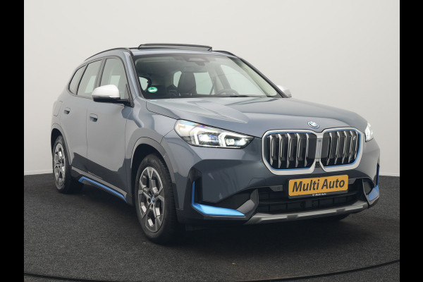 BMW iX1 xDrive30 Launch Edition 313pk Dealer O.H | Panodak | Adaptive Cruise | 360 Camera | Lederen Comfortzetels Massage & Memory | Head Up | Harman Kardon | Keyless |