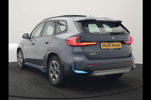 BMW iX1 xDrive30 Launch Edition 313pk Dealer O.H | Panodak | Adaptive Cruise | 360 Camera | Lederen Comfortzetels Massage & Memory | Head Up | Harman Kardon | Keyless |