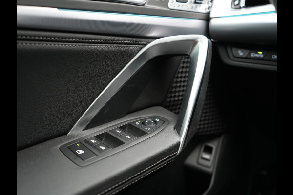 BMW iX1 xDrive30 Launch Edition 313pk Dealer O.H | Panodak | Adaptive Cruise | 360 Camera | Lederen Comfortzetels Massage & Memory | Head Up | Harman Kardon | Keyless |