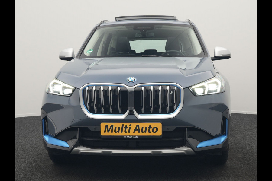 BMW iX1 xDrive30 Launch Edition 313pk Dealer O.H | Panodak | Adaptive Cruise | 360 Camera | Lederen Comfortzetels Massage & Memory | Head Up | Harman Kardon | Keyless |