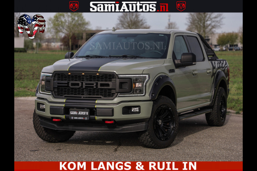 Ford USA F-150 5.0 V8 4X4 | MAT OLIVE GREEN | BIJTELLING VRIJ | ZEER DIK | CAMERA | 3500KG | PANORAMA | LEDER | GO RHINO ROLLBAR | CRUISE CONTROL | PRINS LPG | BAKFLIP COVER | Deze pick-up is leverbaar met zowel een groot rijbewijs (C) als een klein rijbewijs (B). Laat ons weten wat jouw voorkeur is.