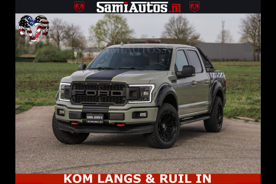 Ford USA F-150 5.0 V8 4X4 | MAT OLIVE GREEN | BIJTELLING VRIJ | ZEER DIK | CAMERA | 3500KG | PANORAMA | LEDER | GO RHINO ROLLBAR | CRUISE CONTROL | PRINS LPG | BAKFLIP COVER | Deze pick-up is leverbaar met zowel een groot rijbewijs (C) als een klein rijbewijs (B). Laat ons weten wat jouw voorkeur is.