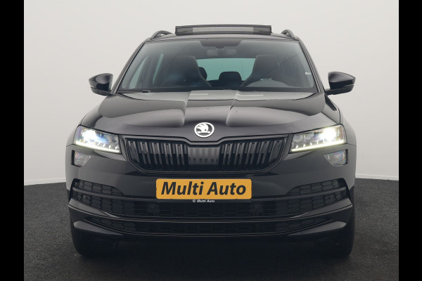 Škoda Karoq 1.5 TSI ACT Sportline 150pk DSG Dealer O.H | Trekhaak Afn. | Panodak | RS Sportstoelen Verwarmd | Adaptive Cruise | Sfeerverlichting | Camera | Apple Carplay | Keyless | Navigatie | DAB | 19" L.M |
