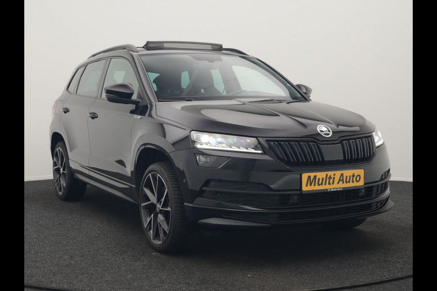 Škoda Karoq 1.5 TSI ACT Sportline 150pk DSG Dealer O.H | Trekhaak Afn. | Panodak | RS Sportstoelen Verwarmd | Adaptive Cruise | Sfeerverlichting | Camera | Apple Carplay | Keyless | Navigatie | DAB | 19" L.M |