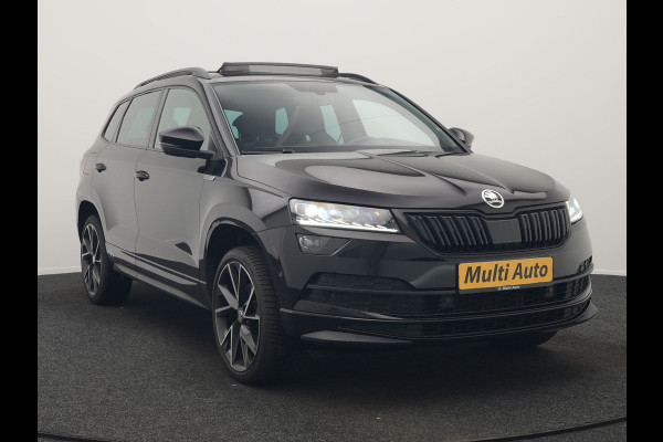 Škoda Karoq 1.5 TSI ACT Sportline 150pk DSG Dealer O.H | Trekhaak Afn. | Panodak | RS Sportstoelen Verwarmd | Adaptive Cruise | Sfeerverlichting | Camera | Apple Carplay | Keyless | Navigatie | DAB | 19" L.M |