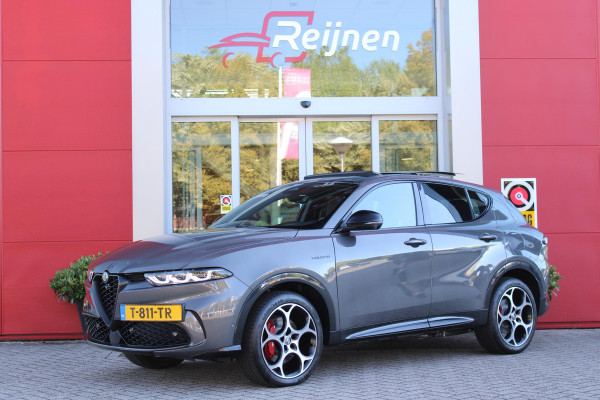 Alfa Romeo Tonale PHEV 280PK VELOCE | NIEUWE AUTO! | PANORAMISCH SCHUIF/KANTEL DAK | WINTERPACK: STOEL/STUUR VERWARMING | TECHNOLOGY PACK: PARKEERWAARSCHUWING VOOR EN ACHTER/360° CAMERA/AUTOMATISCH INPARKEREN/ AUTONOMOUS DRIVING LEVEL 2: ADAPTIVE CRUISE CONTROL/LANE CENTERING ASSIST/TRAFFIC JAM ASSIST DODEHOEK DETECTIE AUTOMATISCH DIMMENDE BUITENSPIEGELS | DRAADLOZE TELEFOONLADER | FULL LED MATRIX KOPLAMPEN | DUAL STAGE VALVE: ACTIEVE DEMPING | KEYLESS ENTRY/START | 19" LICHTMETALEN VELGEN | ROODGESPOTEN BREMBO REMKLAUWEN | NAVIGATIE | DRAADLOZE APPLE CARPLAY/ANDROID AUTO | ELEKTRISCH B