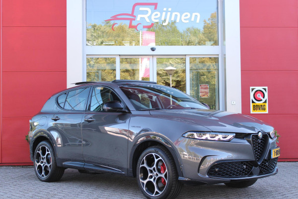 Alfa Romeo Tonale PHEV 280PK VELOCE | NIEUWE AUTO! | PANORAMISCH SCHUIF/KANTEL DAK | WINTERPACK: STOEL/STUUR VERWARMING | TECHNOLOGY PACK: PARKEERWAARSCHUWING VOOR EN ACHTER/360° CAMERA/AUTOMATISCH INPARKEREN/ AUTONOMOUS DRIVING LEVEL 2: ADAPTIVE CRUISE CONTROL/LANE CENTERING ASSIST/TRAFFIC JAM ASSIST DODEHOEK DETECTIE AUTOMATISCH DIMMENDE BUITENSPIEGELS | DRAADLOZE TELEFOONLADER | FULL LED MATRIX KOPLAMPEN | DUAL STAGE VALVE: ACTIEVE DEMPING | KEYLESS ENTRY/START | 19" LICHTMETALEN VELGEN | ROODGESPOTEN BREMBO REMKLAUWEN | NAVIGATIE | DRAADLOZE APPLE CARPLAY/ANDROID AUTO | ELEKTRISCH B