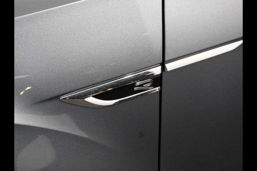 Volkswagen T-Roc 1.5 TSI DSG R-Line + Design pakket Black style | Panorama dak | Trekhaak | Navigatie | Apple Carplay/Android Auto | Climate control