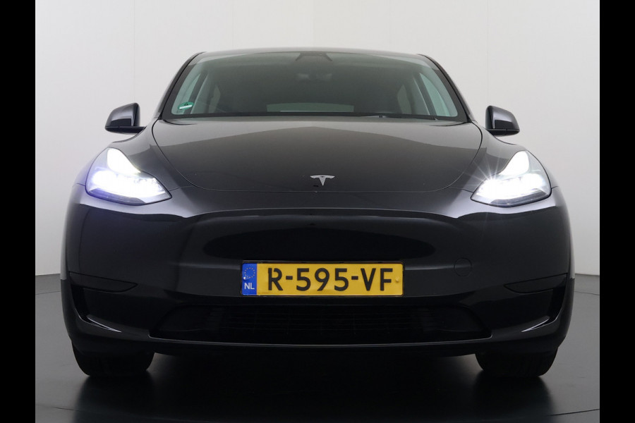 Tesla Model Y 300pk Warmtepomp LFP-Accu Leer Lmv Camera's Panoramadak Adap.Cruise Navi Ecc SOH 92% RWD Autopilot Stoel+Stuur+Achterbank Verwarming Elek.Achterklep Dodehoek detector Draadloze telefoonlader 1e Eigenaar Fabrieksgarantie op Motor en Accu tot 13-12-2030/160.000km 1.600KG-Trekvermogen