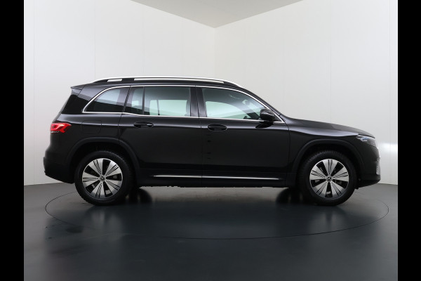 Mercedes-Benz EQB 250 7 Persoons 69kWh Stoelverwarming 1/2 Leder Navi Ecc Camera Cruisecontrol Apple Carplay Android Auto Pdc Business Line DAB Bluetooth Elek.Achterklep Led Lmv Dodehoekassistent DAB+ Rijstrooksensor 1e Eigenaar Dealeronderhouden Origineel Nederlandse Auto