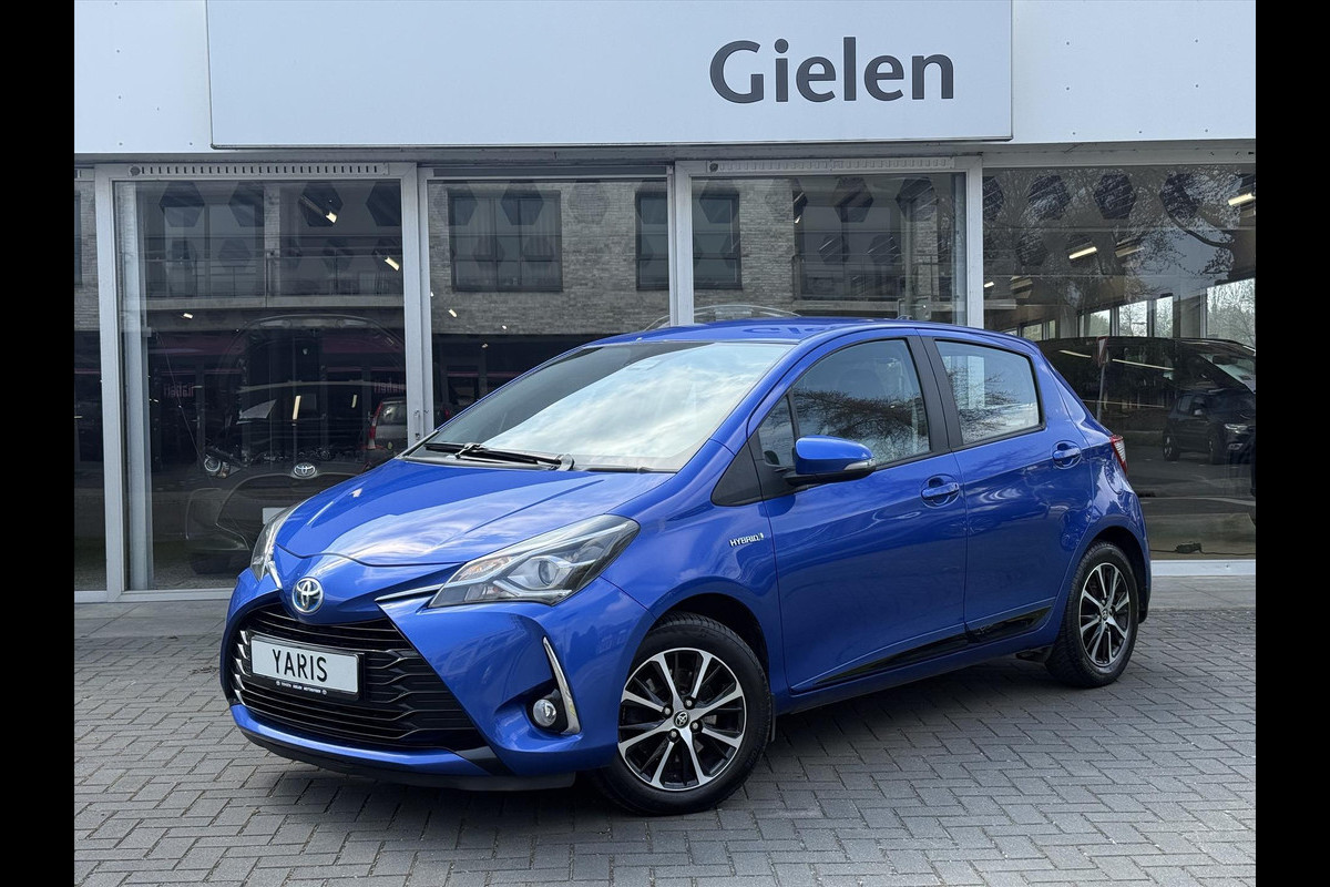 Toyota Yaris 1.5 Full Hybrid Dynamic | Lichtmetalen velgen, Parkeercamera, Licht + Regensensor, Cruise control, Climate control
