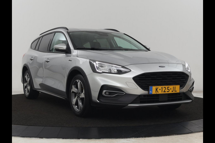 Ford Focus 1.0 EcoBoost Hybrid Active | Stoelverwarming | Trekhaak | Camera | Stuurverwarming | Carplay | Keyless | Full LED | Navigatie | Parkeerhulp | Climate control | Cruise control